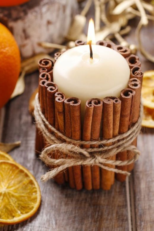 Candle decorated with cinnamon sticks, christmas decoration set